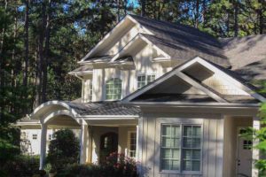 Metal Barrel Dormer on Pinehurst Home